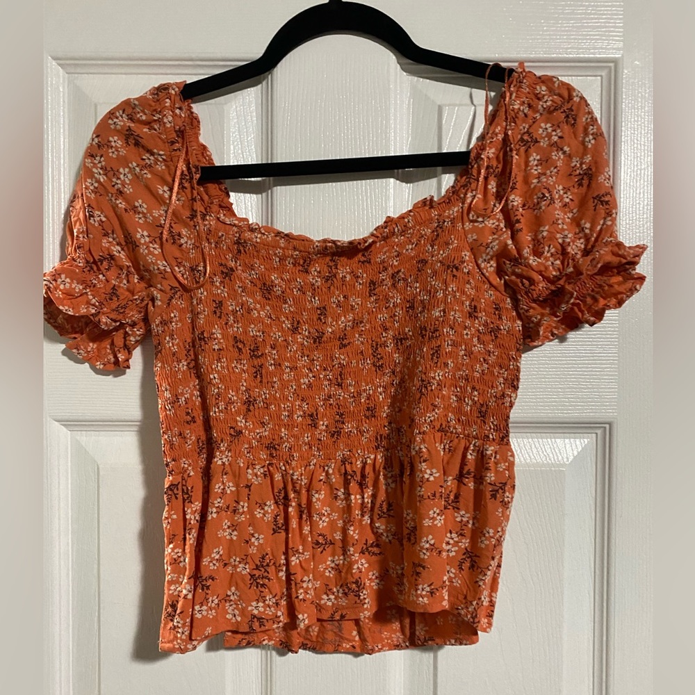 Patron of P. Small. Off the shoulder crop top.